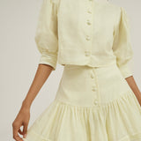Laney – Pastelselt sidrunine frill seelikshorts
